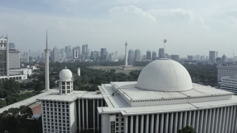 istiqlal mosque jakarta indonesia with the national monument in the background