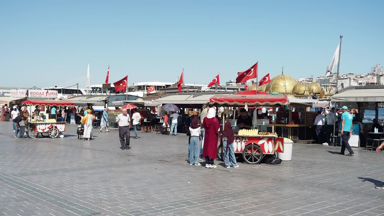 Busy Street Scene in Istanbul with Food Stalls and People Walking
