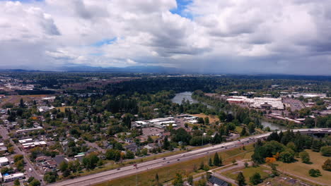 flying over the beautiful quiet city of eugene in oregon on a cloudy summer day