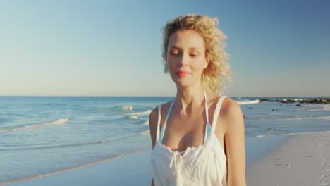 young woman relaxing by the sea 4k