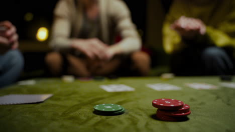 camera focuses on two stacks of poker chips 1