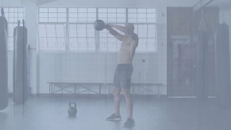 muscular man swinging kettlebell in fitness studio, showing animated strength graph overlay