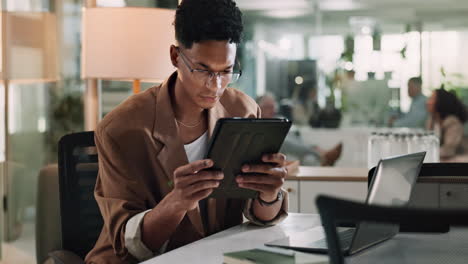 Business Person Working on Tablet in Office
