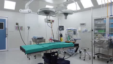 inside operating room with equipment, no people