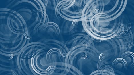 fondo azul con un spray de círculos blancos trenzados
