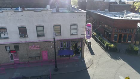 historic aerial footage of voodoo doughnut in downtown portland, oregon empty due to covid-19.