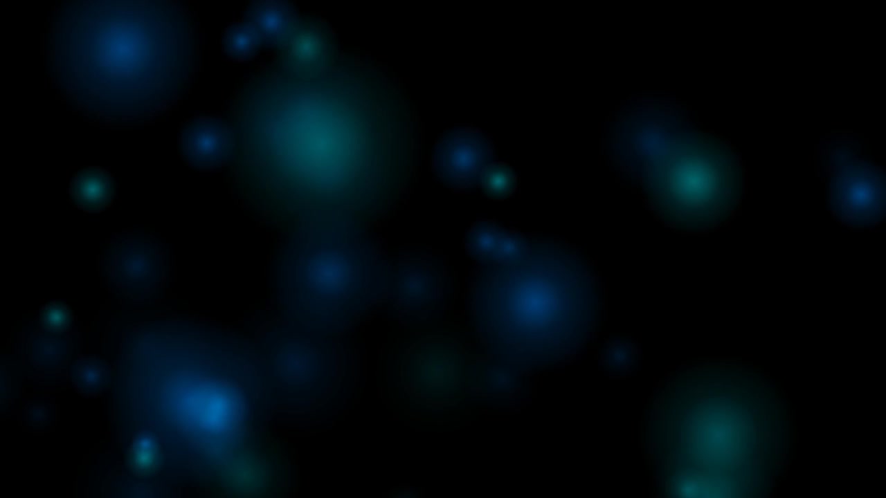 Abstract Blue and Teal Bokeh Light Particles on Black Background