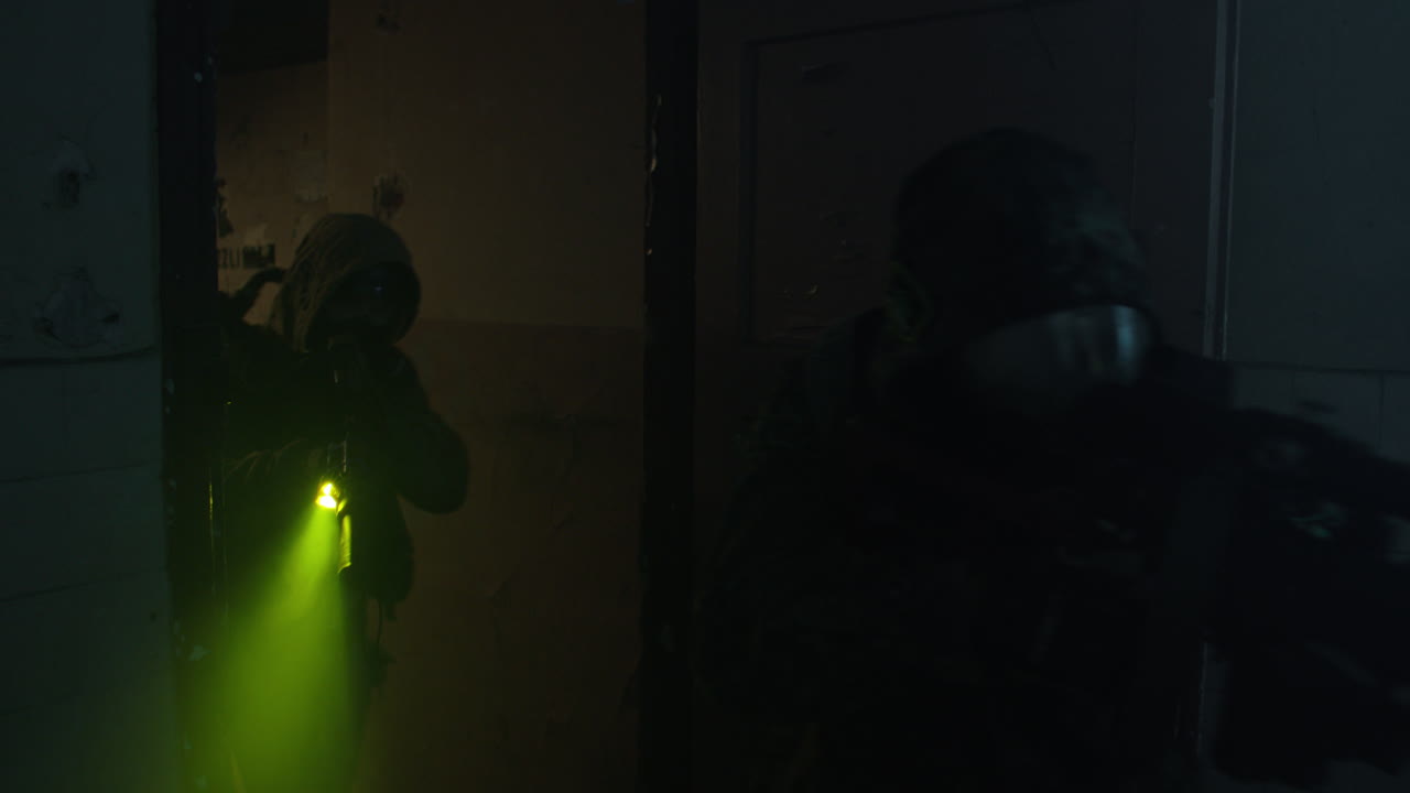 Military Operation in a Damaged Building at Night