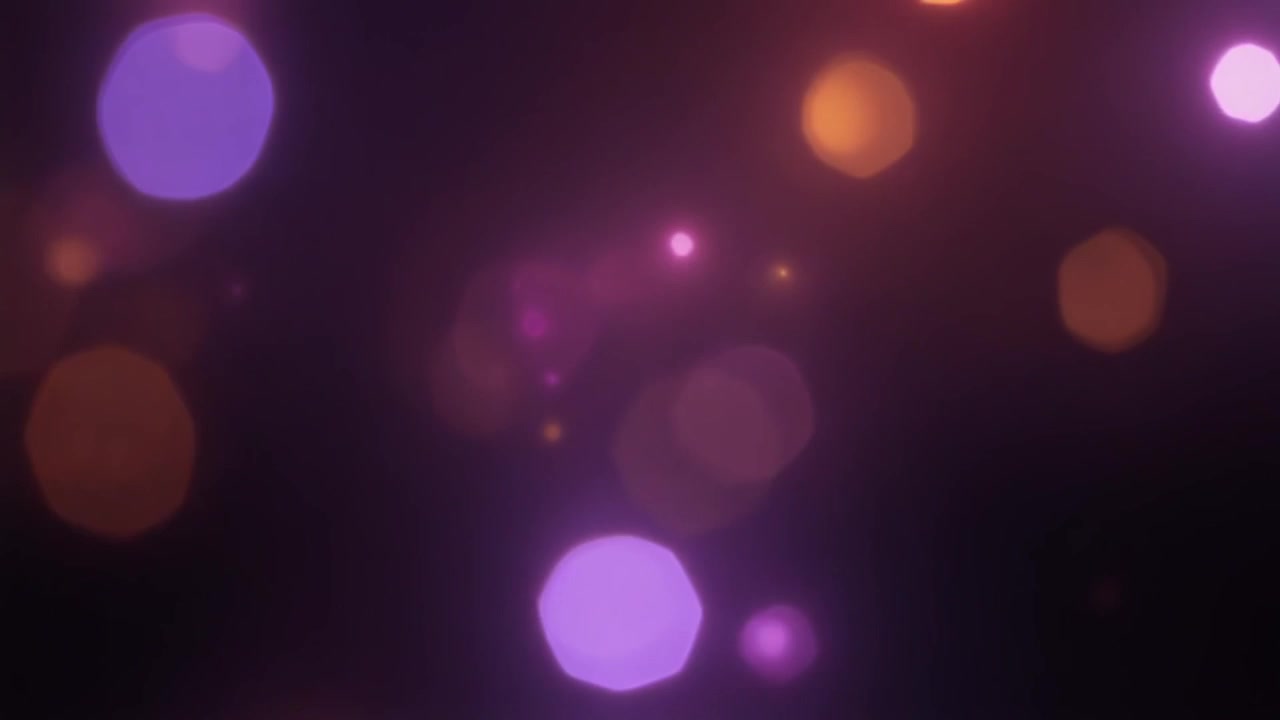 Abstract Background with Floating Pink and Orange Bokeh Lights