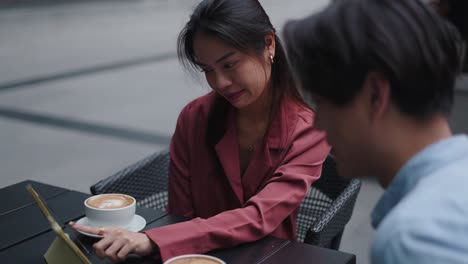 business meeting at outdoor cafe