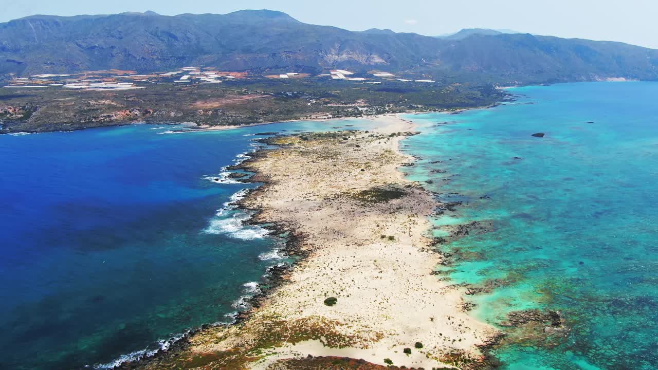 Aerial of a narrow stripe of sand connecting Elafonisi and the island of Crete, Greece