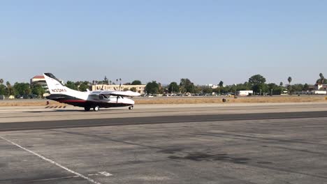 airplane passes by on taxiway at airport