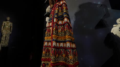 intricate embroidered dresses and cape