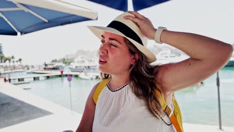woman experiencing heat in a marina