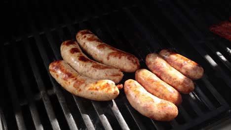 grilled sausages on a barbecue grill