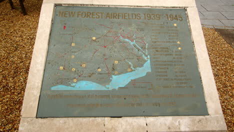 mid shot of the memorial plaque showing the map of the airfields at the new forest airfields memorial in the new forest