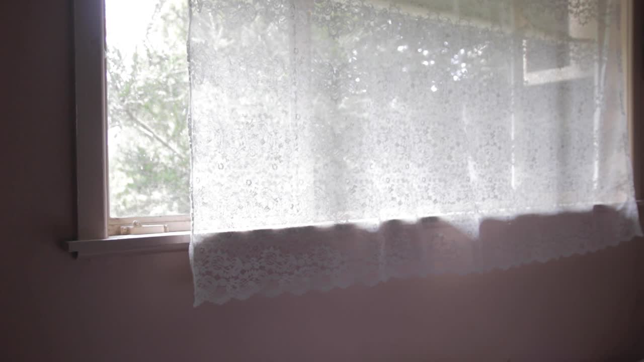 Window with views from the room to the garden is recorded by a holiday in autumn afternoon with chill and relax vibe