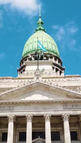 neoclassical dome and statues at argentine national congress in daylight, vertical view