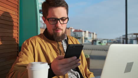 Man working from a cafe
