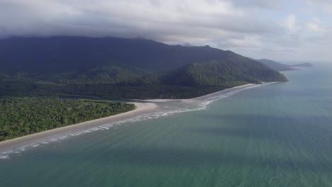 pristine water at the daintree national park in far north queensland, australia - aerial drone shot