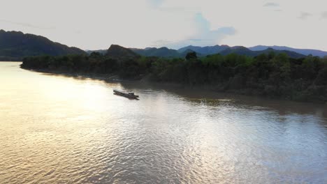 mekong river sunset landscape with boat