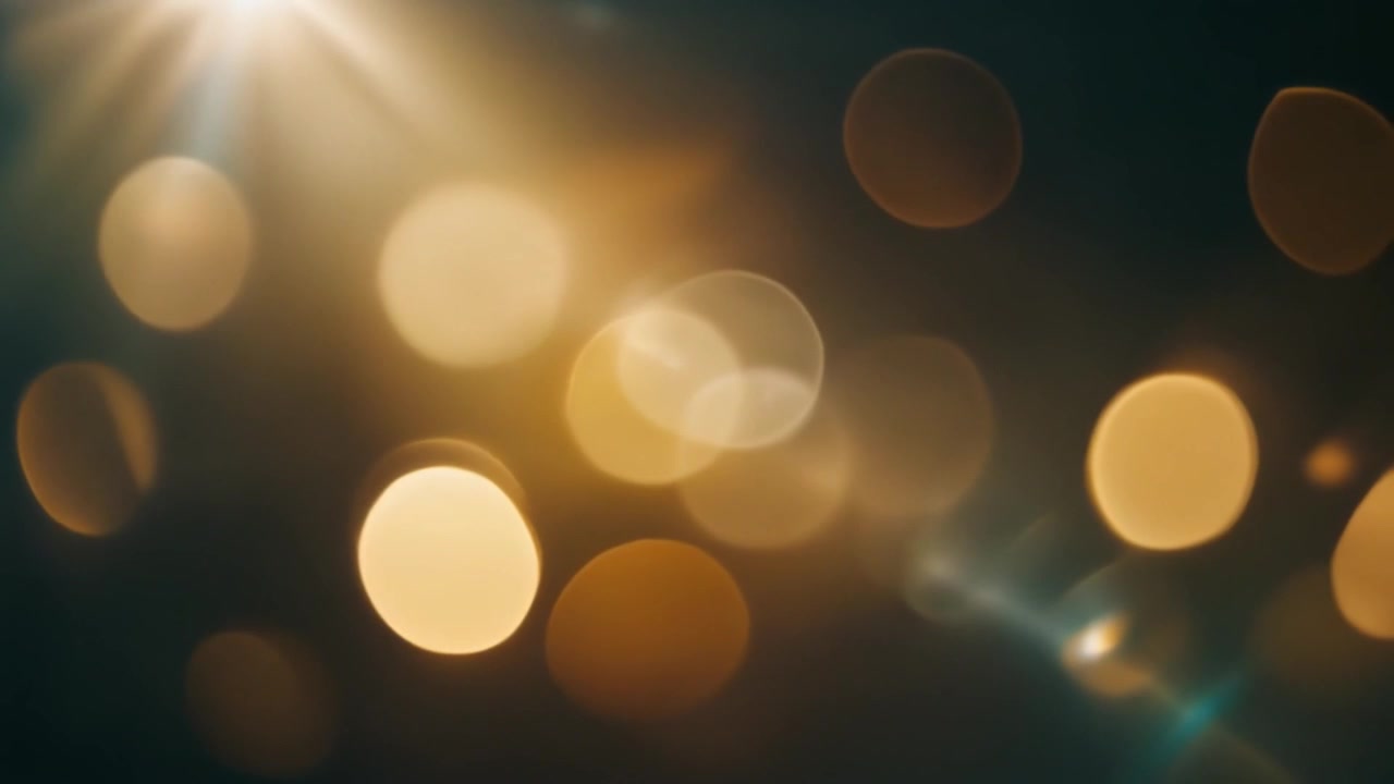 Sfondo astratto con luci bokeh dorate e riflesso lente