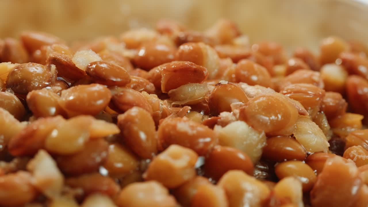 Lentils macro, Open metal can with preserved steamed brown lentils close up isolated on white background