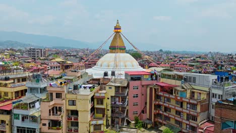 flying towards the bouddha stupa buddhist temple in kathmandu, nepal