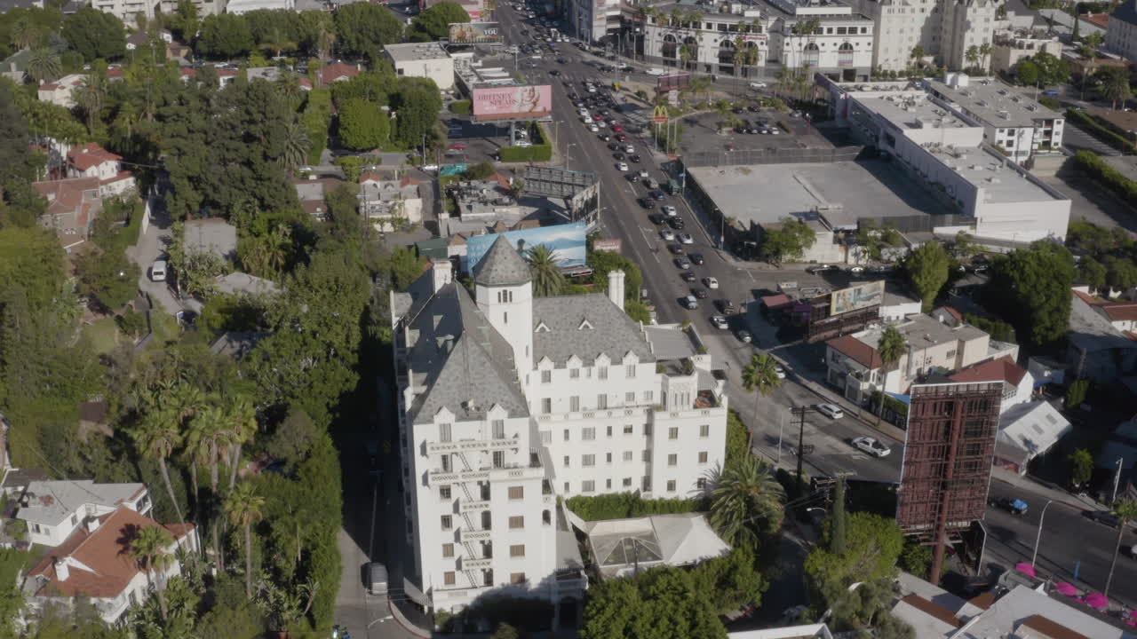 Flight around the Chateau Marmont in Los Angeles California with Sunset Boulevard and The Hollywood Hills in the background.