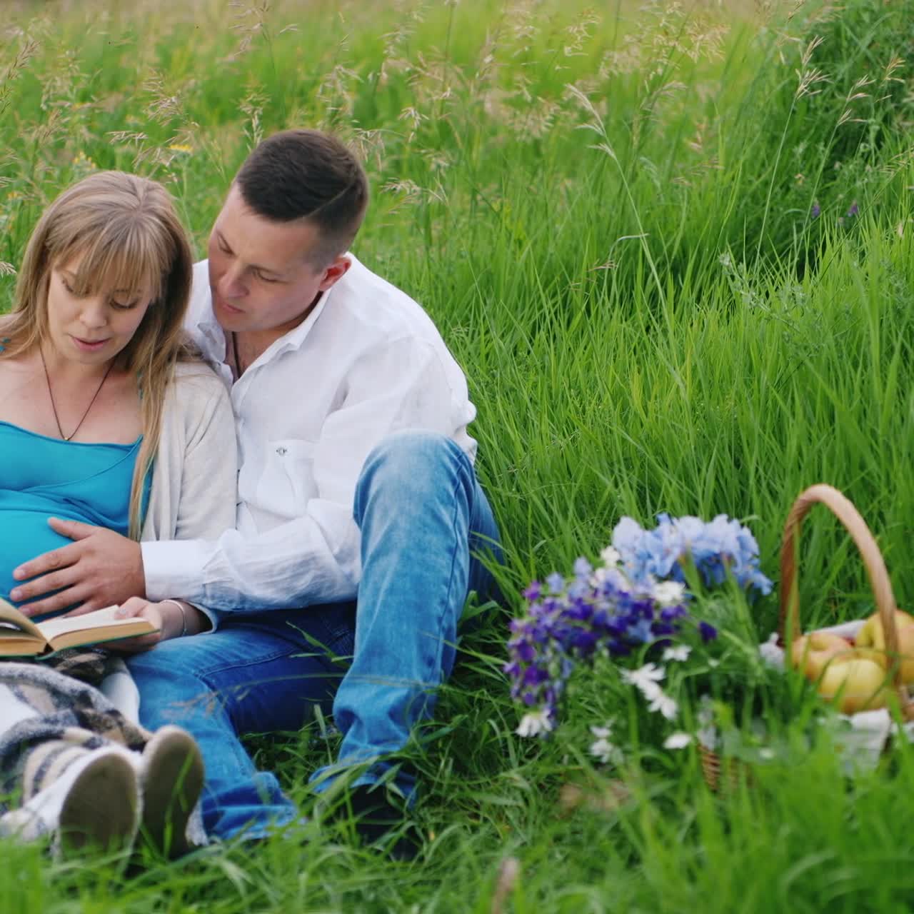 Future Parents Read in a Meadow
