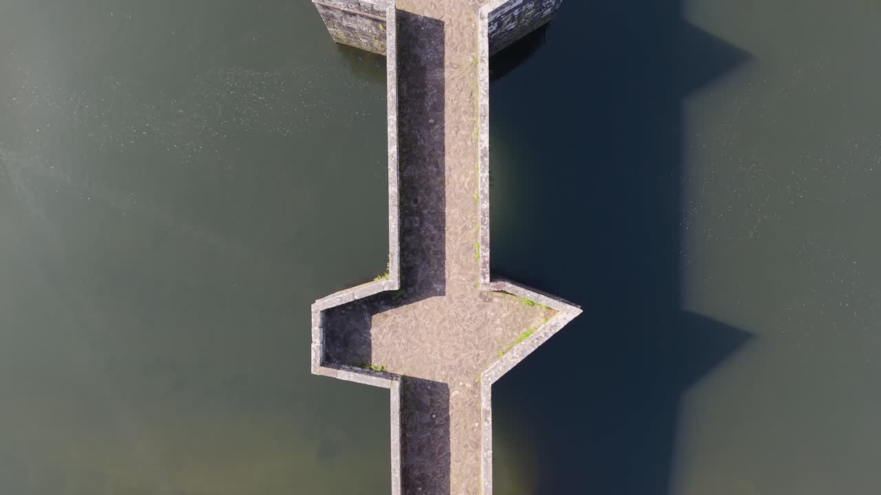 Top View Of Brandomil Historic Stone Bridge In Zas, Spain. Aerial Ascending Shot