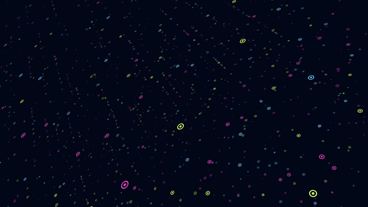 Vibrant array of colorful dots on dark background