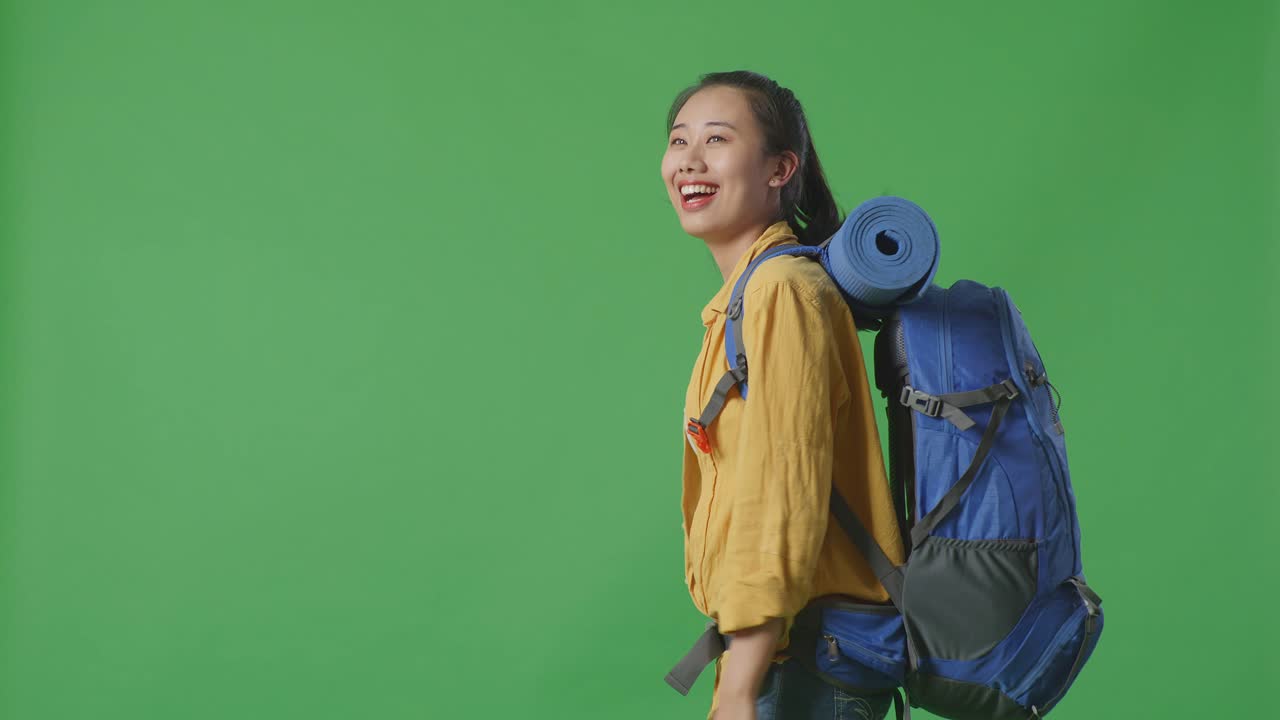 Woman with Backpack Walking