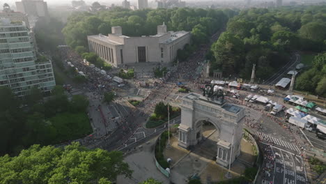 aerial view of people running the brooklyn half marathon. shot on a summer morning at grand army plaza.