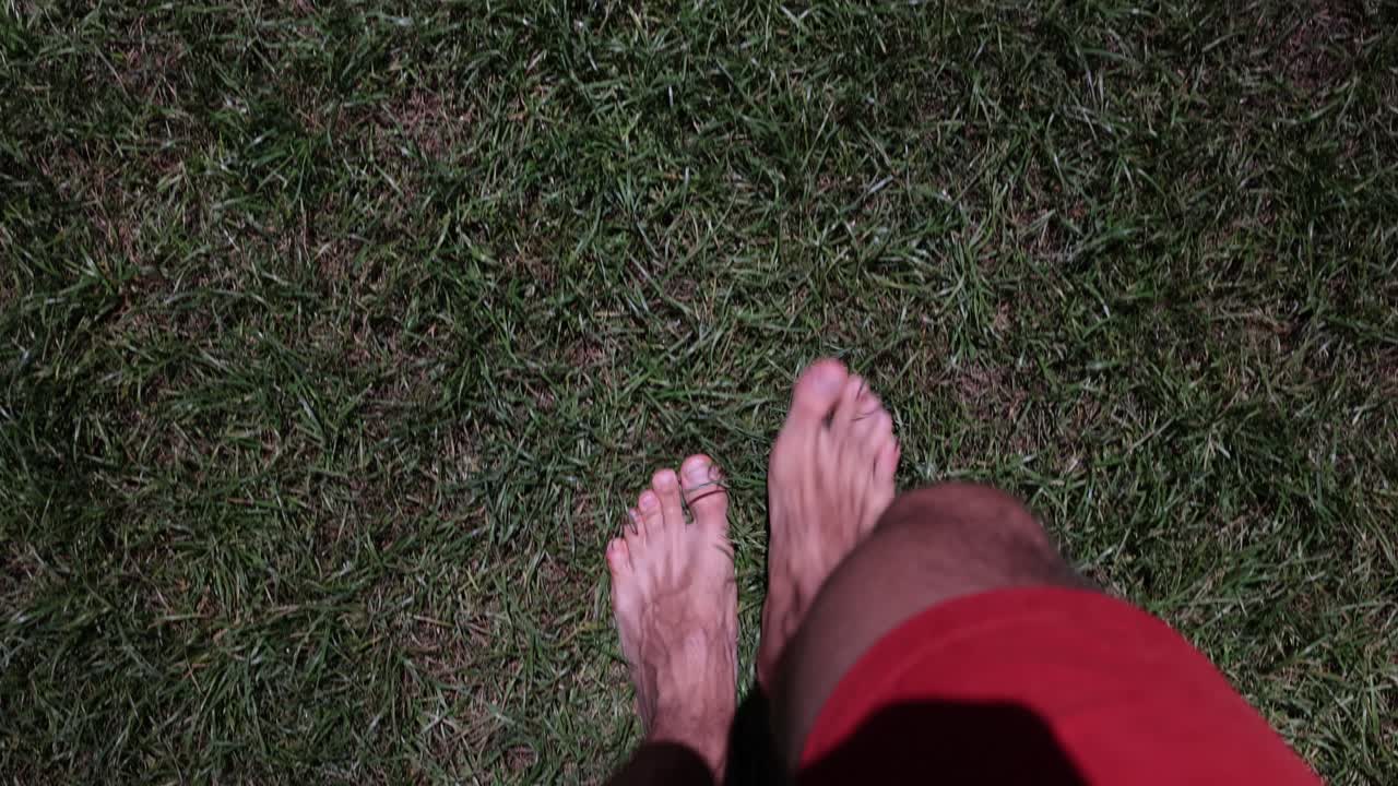Bare Feet Walking on Green Grass