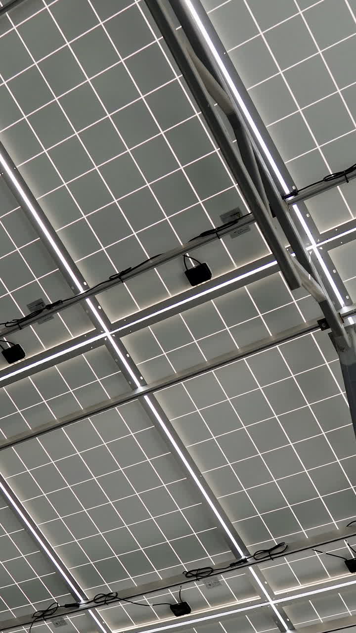 back side of solar panel. aluminum construction with electric wires. Vertical video