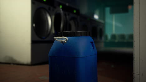 blue plastic container in a laundry mat