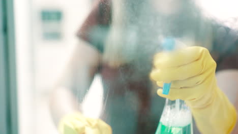 Cloth,-spray-bottle-and-person-hands-cleaning