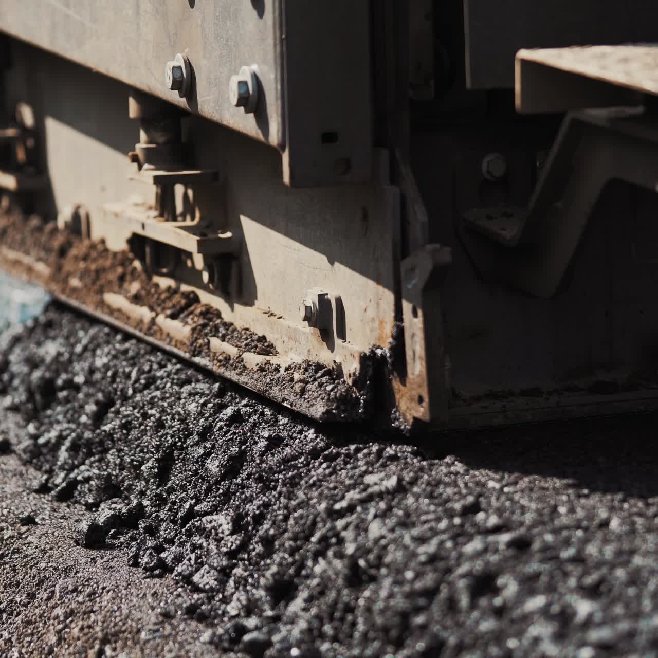 Works road roller with asphalt