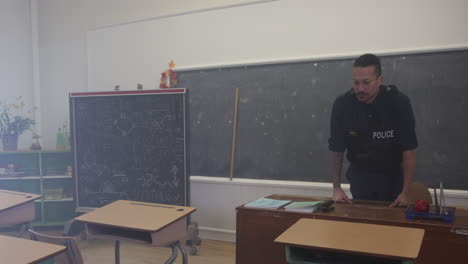 dolly zoom police officer in a classroom