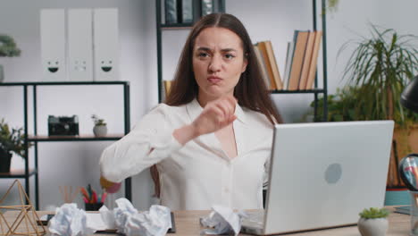 Angry-furious-woman-working-at-home-office-throwing-crumpled-paper,-having-nervous-breakdown-at-work