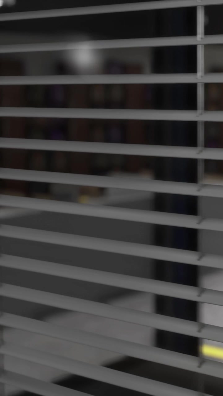 Light and shadow dance through horizontal blinds in a quiet room