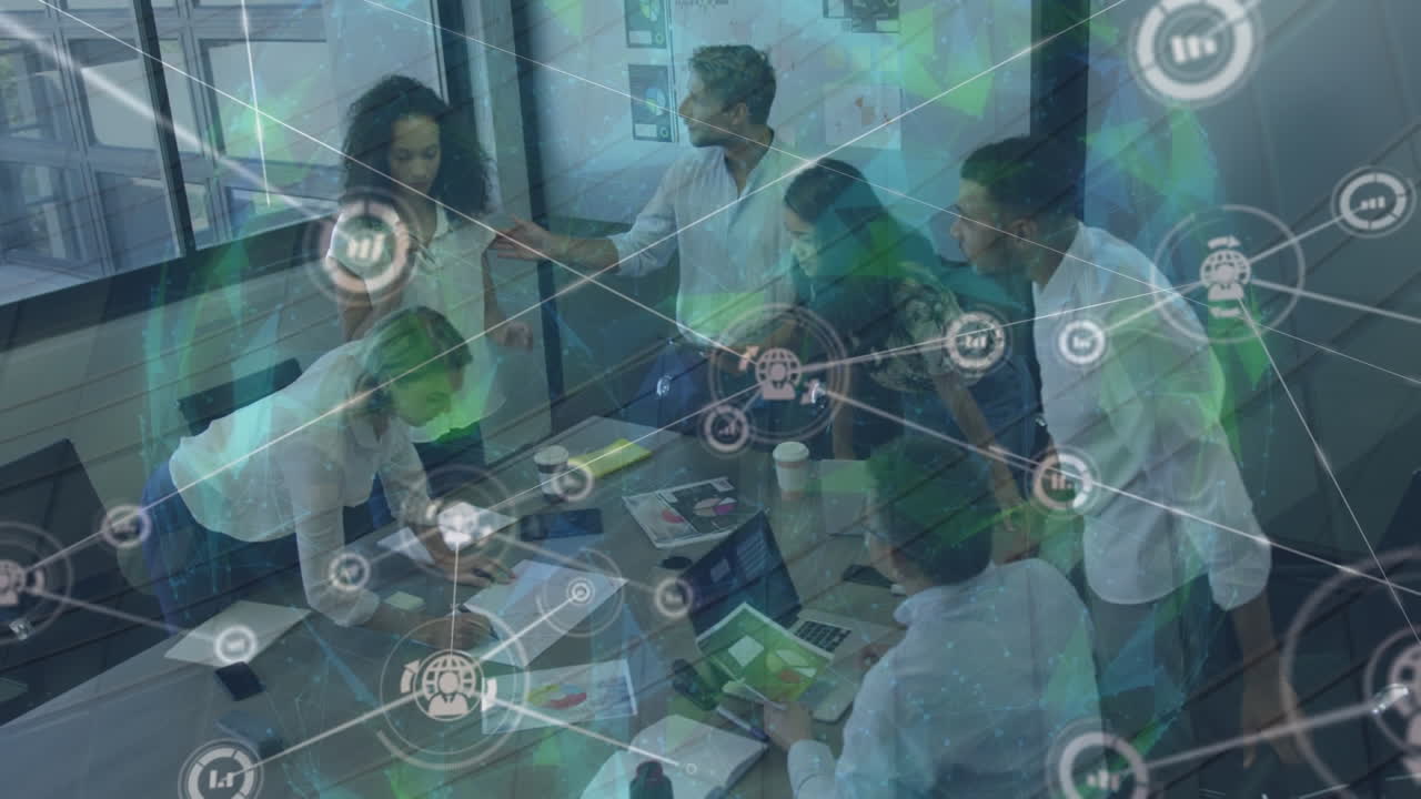 Animation of network of data icons over diverse colleagues brainstorming in office