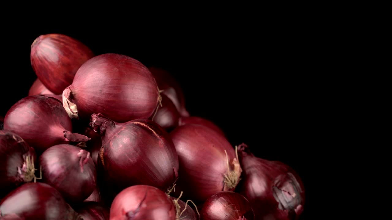fondo de cebollas rojas giratorias