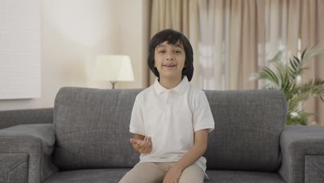 Happy-Indian-boy-talking-to-the-camera