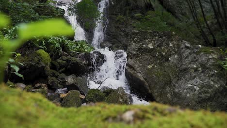 Scenic-waterfall-on-rocky-stream-in-forest-in-northern-Italy