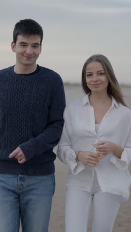 couple's serene beach stroll and tranquil ocean views