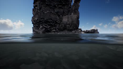 ocean seascape with sky and ocean wave splitted by waterline to underwater part