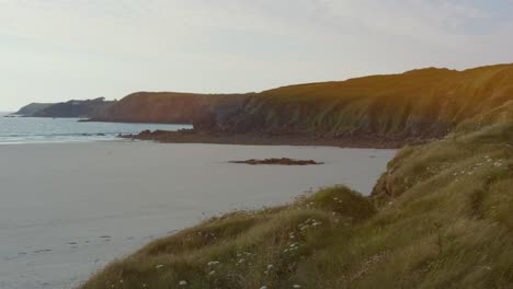 high-rocky-coast-with-grass-meadow