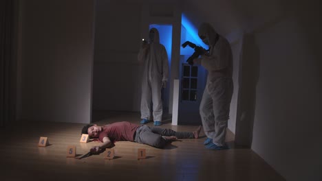 forensic expert working on a crime scene